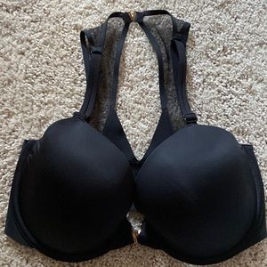 Victoria secret lines Demi 34DDD. Black with gold detail. Sheer back straps.
